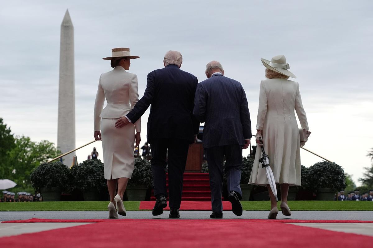 President Trump gives first lady Melania a playful tap on the tush during meeting with King Charles and Queen Camilla