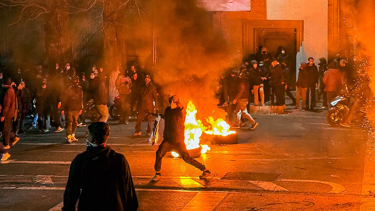 Protesters in Iran burning stuff
