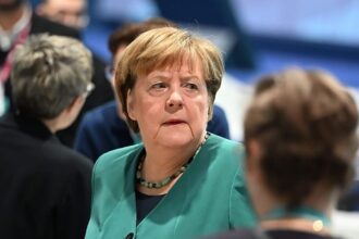 EU honours Merkel as stabilizer in nod to Trump-era turbulence