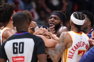 Two players ejected after scrum amid Knicks’ 50-point lead against Hawks sends referee crashing to the court
