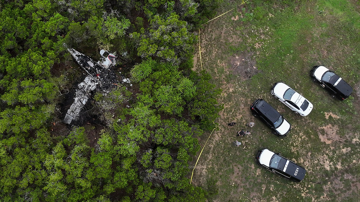 A crashed Cessna airplane in a wooded area on Round Rock Road in Wimberley, Texas