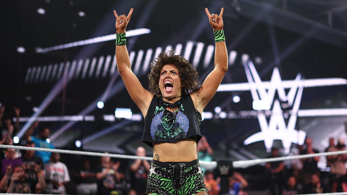 Lizzy Rain celebrating her win at WWE Performance Center in Orlando, Florida