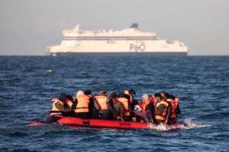 200,000 small boat arrivals loom amid UK raising threat level to ‘severe’ following recent terror attack