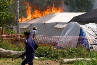 Ebola treatment center set on fire in Congo after residents clash with authorities over victim’s body