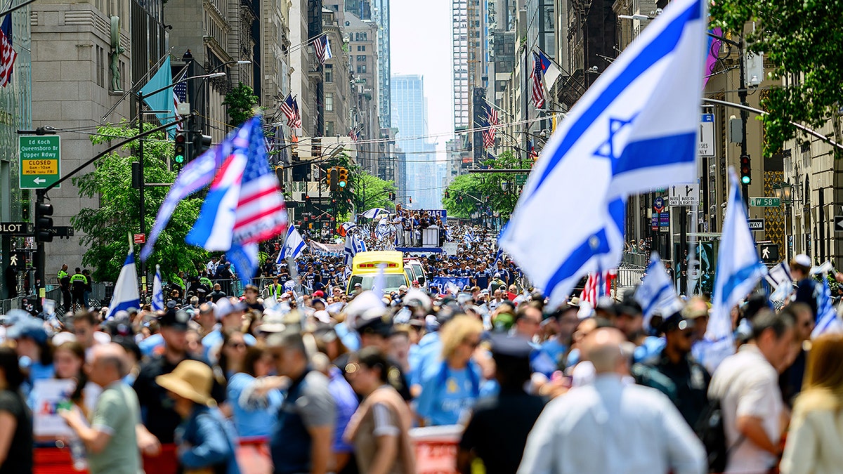 Participants marching in the Israel Day Parade in New York City