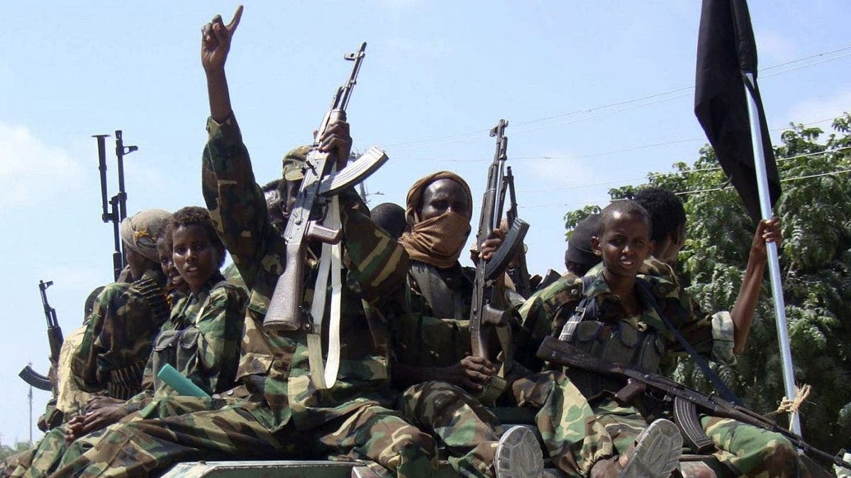 Members of al Shabaab parading through streets of Mogadishu Somalia