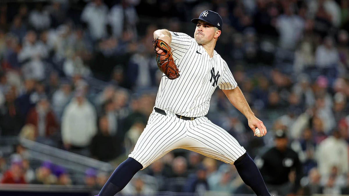 New York Yankees pitcher Carlos Rodon pitching during a game at Yankee Stadium