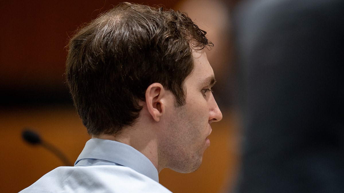 Tyler Robinson standing in 4th District Court in Provo during a hearing