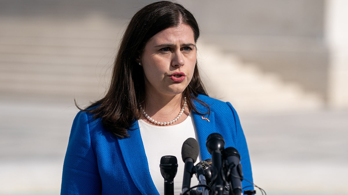 Jena Griswold speaking to media outside the US Supreme Court in Washington, D.C.