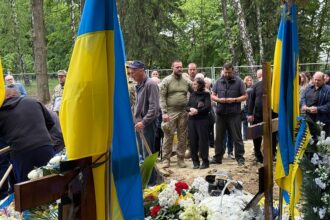 Funerals, beauty queens and bombs: The Ukrainian city that won’t let Putin win