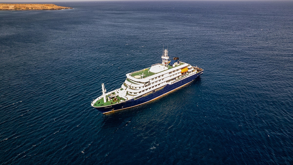 The cruise ship MV Hondius stationary off the port of Praia in Cape Verde.