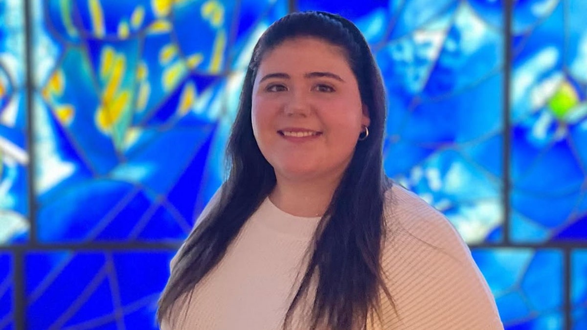 Sheridan Gorman standing and smiling in Chicago, Illinois