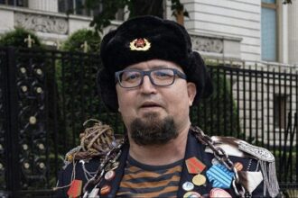 Russian artist critical of Putin shot dead in Poland, officials say