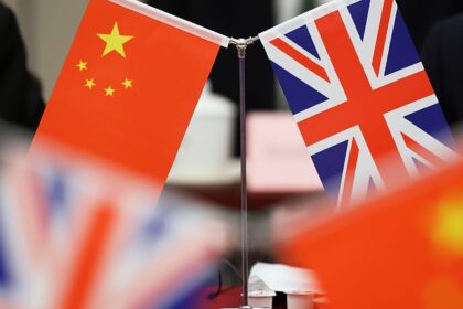 Two Chinese-British dual nationals jailed in dissident spying case