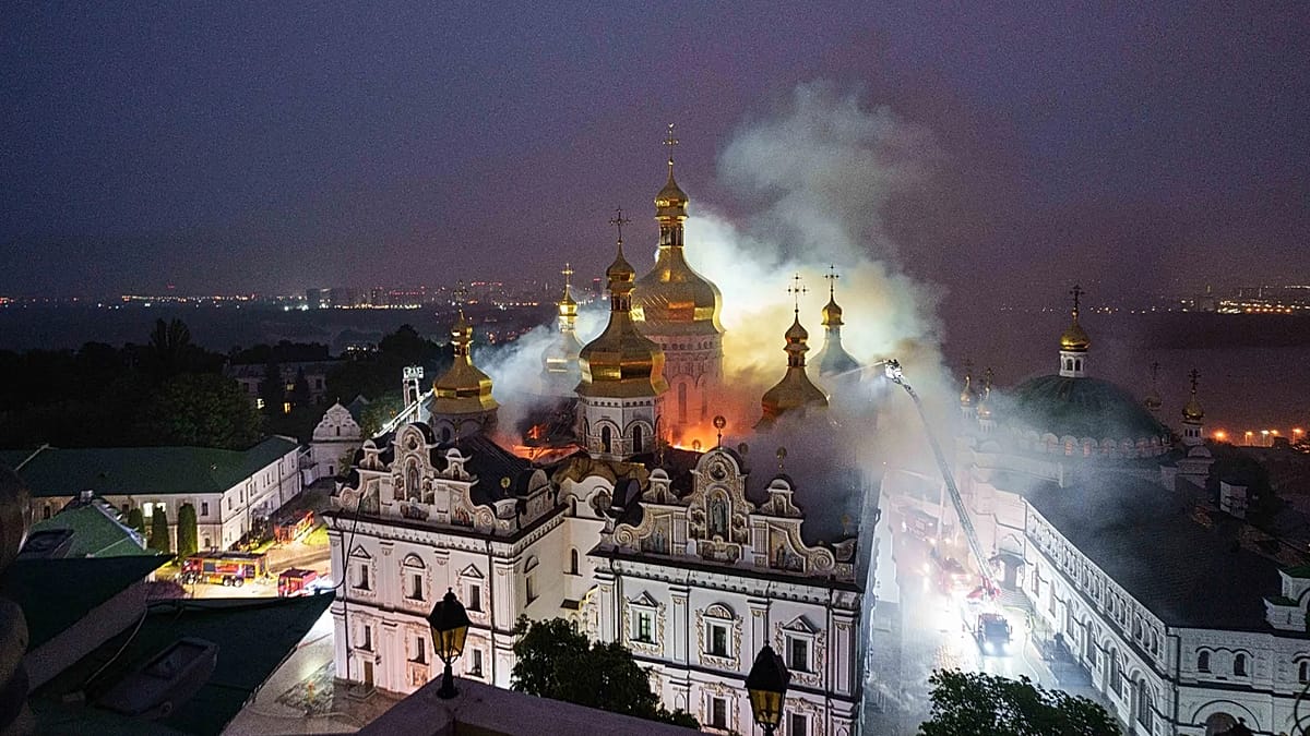 Russian strikes on Kyiv kill at least 11 and leave cathedral in flames