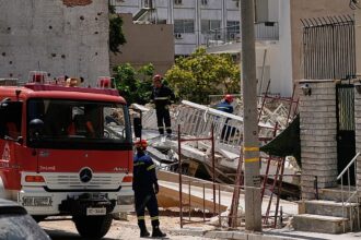 Four trapped after Athens apartment block collapses, fire brigade says