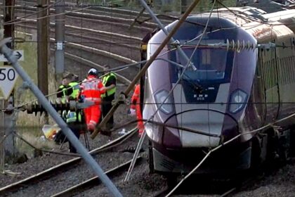 Driver dies and 33 seriously injured after two trains collide in UK