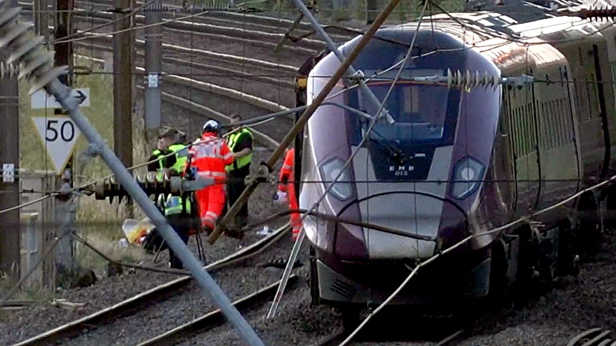 Driver dies and 33 seriously injured after two trains collide in UK