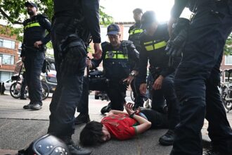 Morocco’s World Cup win sparks celebrations and clashes in the Hague