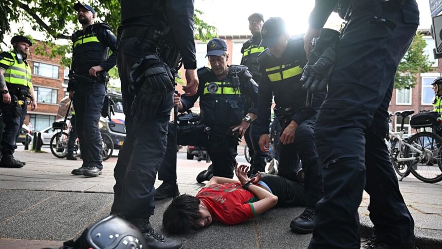 Morocco’s World Cup win sparks celebrations and clashes in the Hague