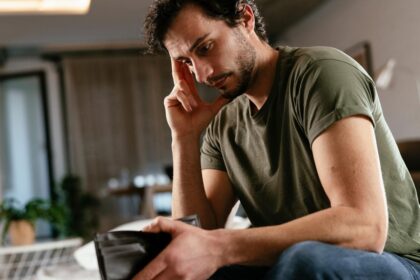 Financial struggles are taking a toll on men’s mental health: survey