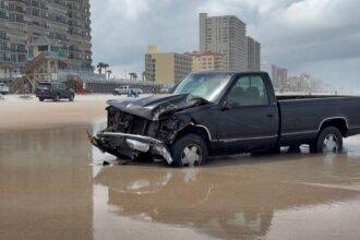 Florida beach toll booth worker killed after driver rams structure before getting stuck in sand, sheriff says