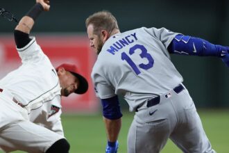 MLB stars leave divisional game after scary collision at first base leaves both injured