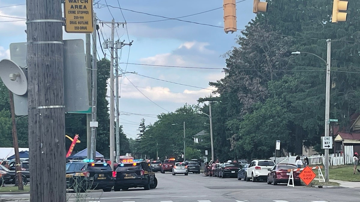 Police officers working at the scene of a shooting near a festival in Toledo Ohio