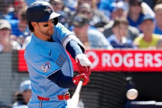 Blue Jays rally while Orioles’ double-play attempt negated as umps rule infielder failed to try to tag runner