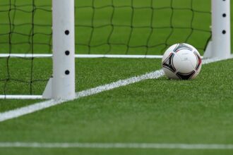 Lawsuit alleges soccer coach benched teen who was injured by teammate for alleged racial slur