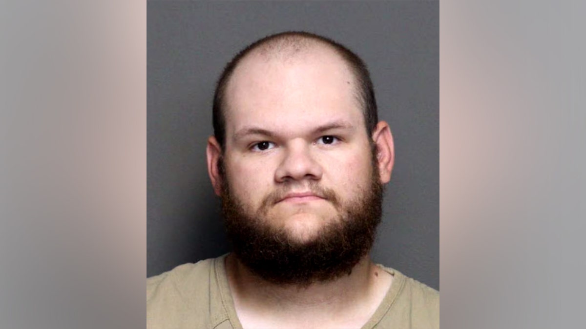 Tycen Proper facing forward in a mugshot photo.