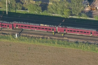 Two-train crash leaves at least 1 dead, 89 injured as emergency crews rush to chaotic scene