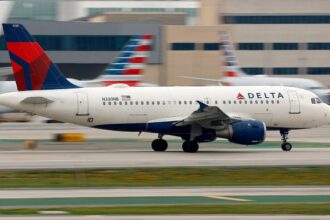 FAA investigates after incoming plane executes go-around due to aircraft leaving from intersecting runway