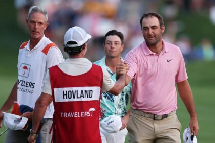 Scottie Scheffler drains clutch putt to force sudden-death Monday playoff with Viktor Hovland at Travelers