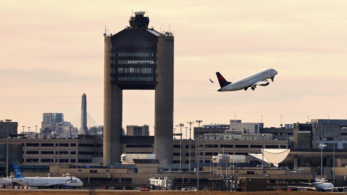 A Delta airplane taking off from Boston Logan International Airport.