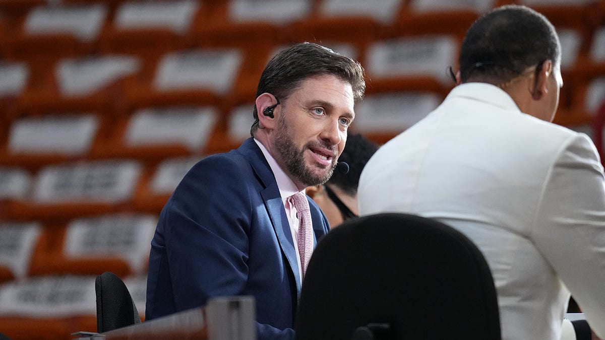 Mike Greenberg looking on before an NBA playoff game