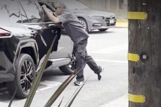 Angry man seen dangling off the side of car in San Francisco road rage incident: ‘He’s running him over’