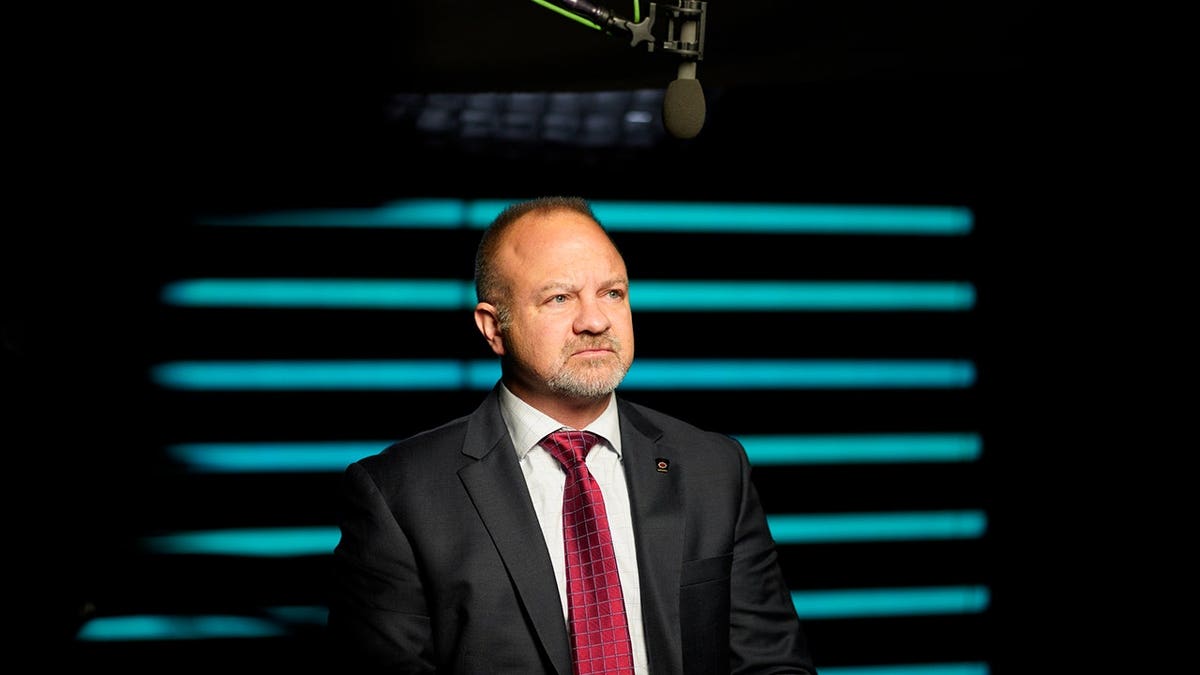 Captain John Nederostek speaking during an interview