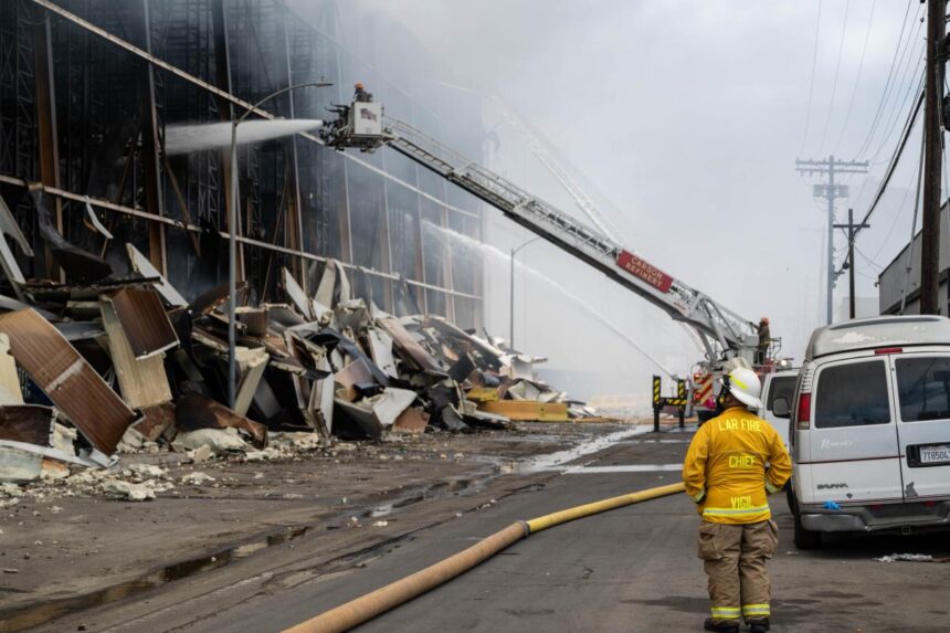 Race against time in fight against 500,000sqf LA inferno amid fears of biohazard fallout