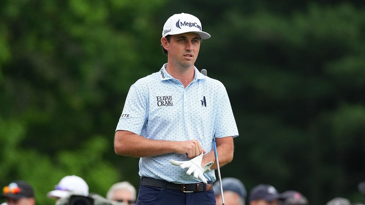 J.T. Poston stands on the first tee box at TPC River Highlands in Cromwell, Connecticut.