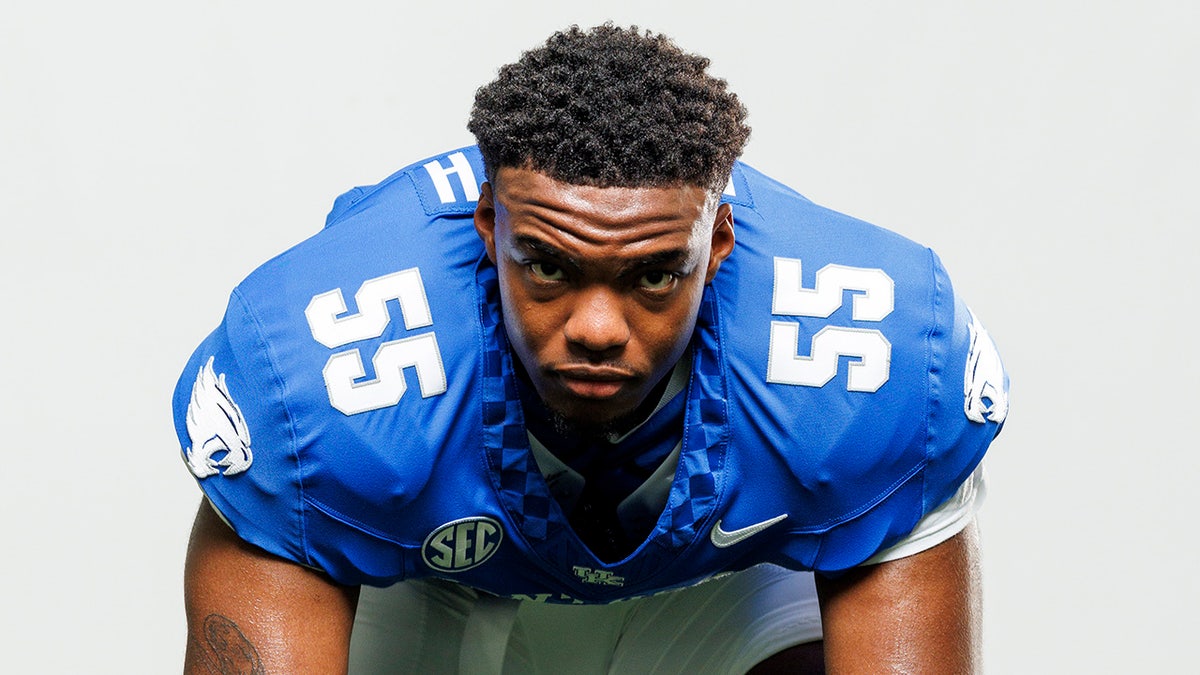Kentucky football player Nic Smith poses during a photo shoot.