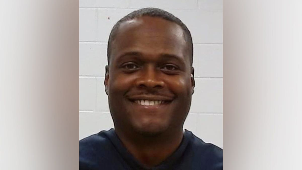 Sholdon Daniels standing in front of a neutral background