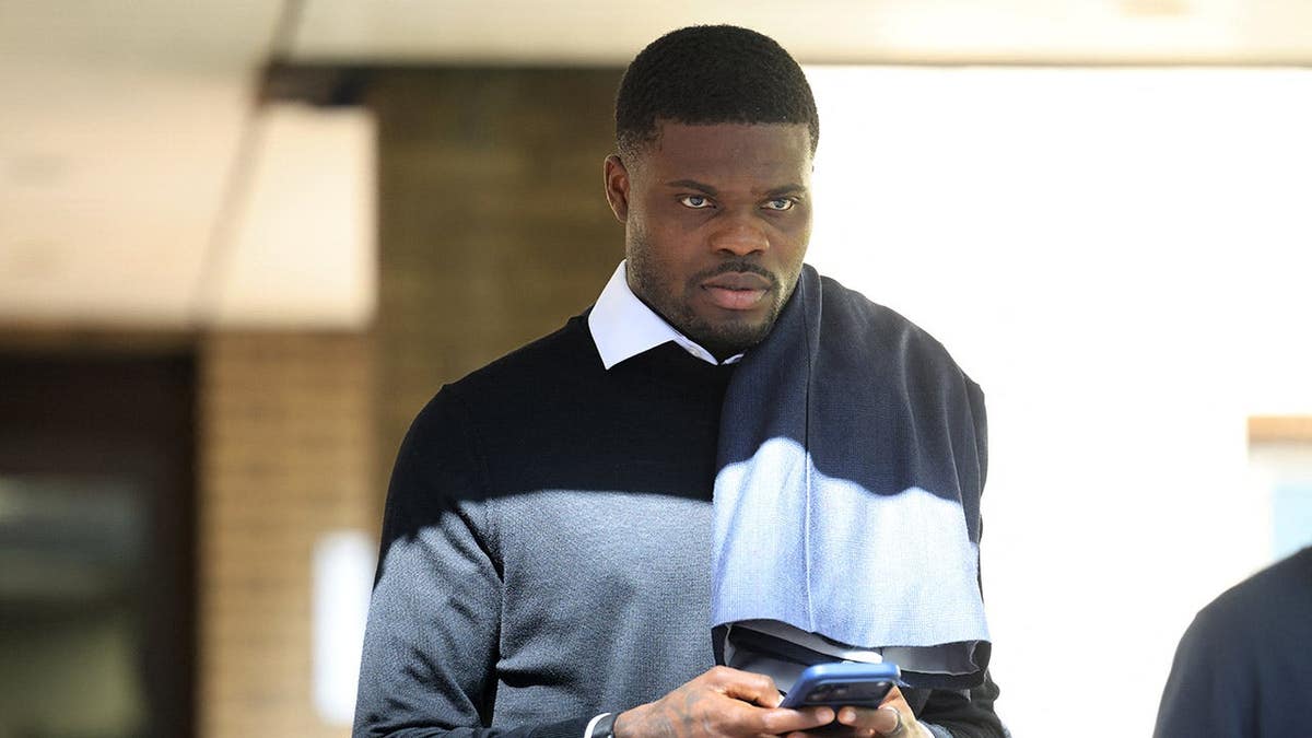 Former Arsenal midfielder Thomas Partey walking outside Southwark Crown Court in London