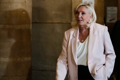 Paris court clears way for Le Pen presidential bid but with ankle tag