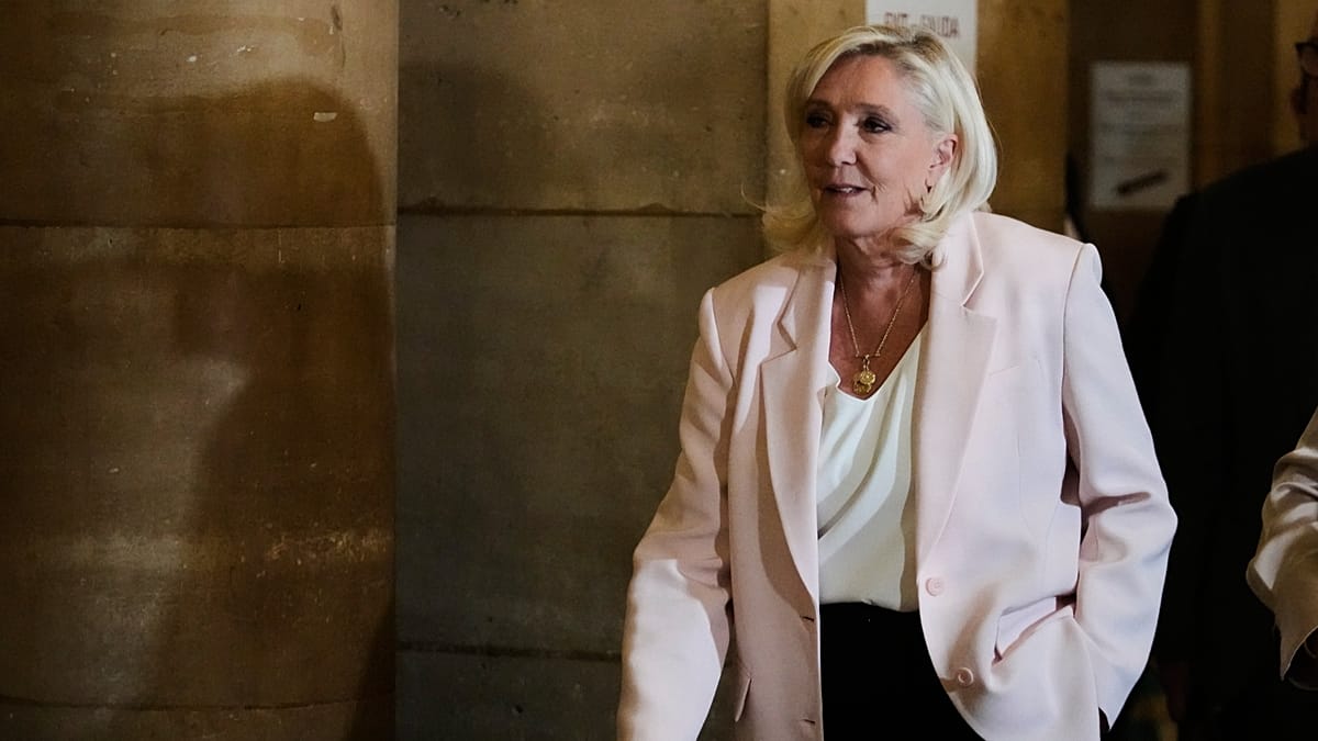 Paris court clears way for Le Pen presidential bid but with ankle tag