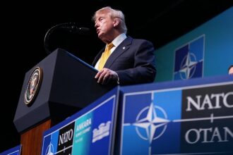 Trump tempers fury to end two-day NATO summit on high note