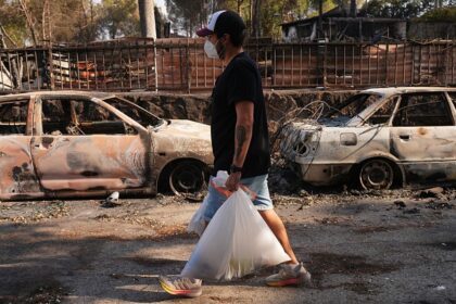 Fire evacuees return in Spain while France wary of worsening weather
