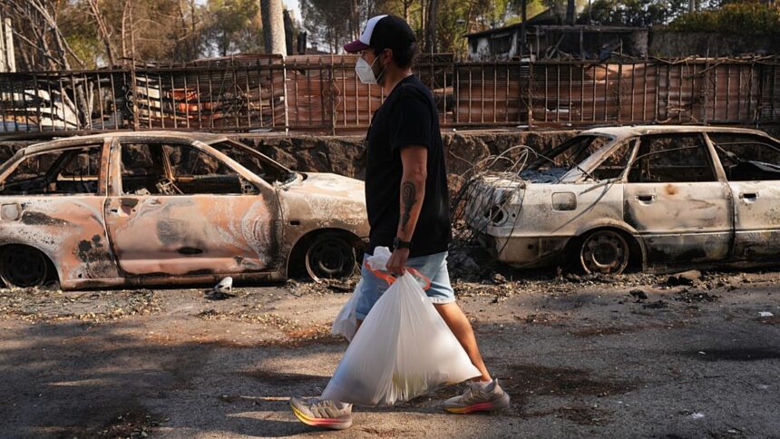 Fire evacuees return in Spain while France wary of worsening weather