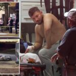 Off-duty NYPD cop stabbed in hand by stranger while walking with friend in NYC