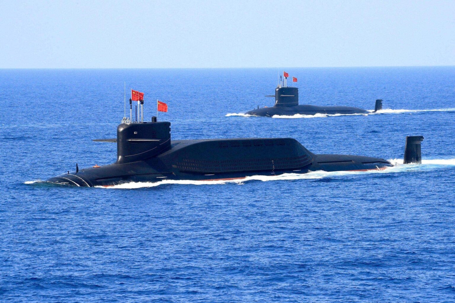 China launches rare submarine ballistic missile as Pacific allies strengthen defense ties before NATO summit